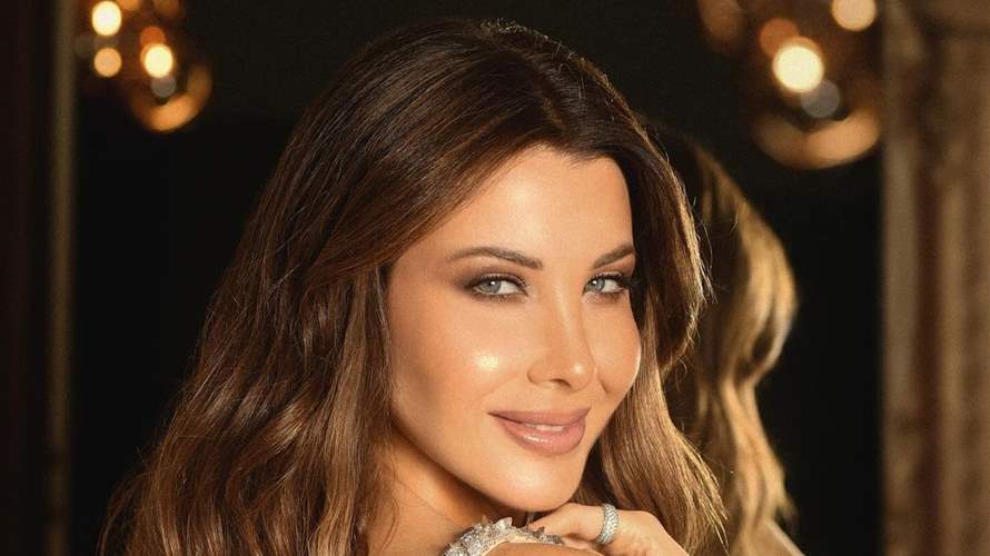 في أحد الشعانين ... نانسي عجرم تعايد متابعيها بصورة عائلية 